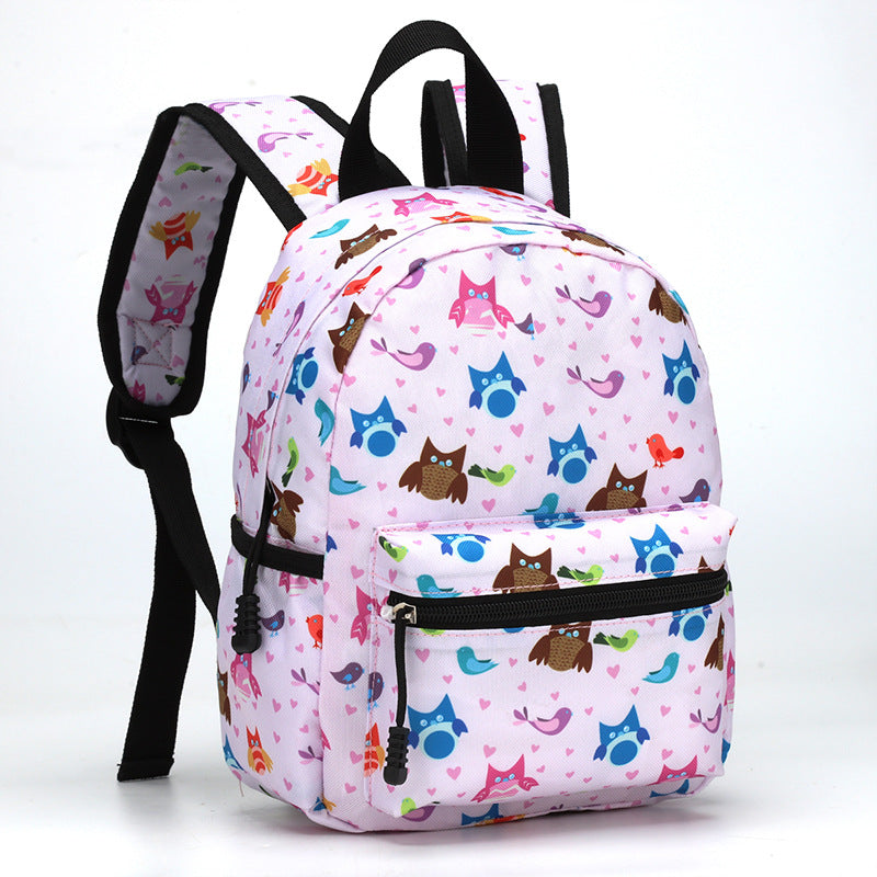 Kids lightweight cartoon backpack by IBG, 10.6-inch school bag featuring colorful cartoon character design for children.