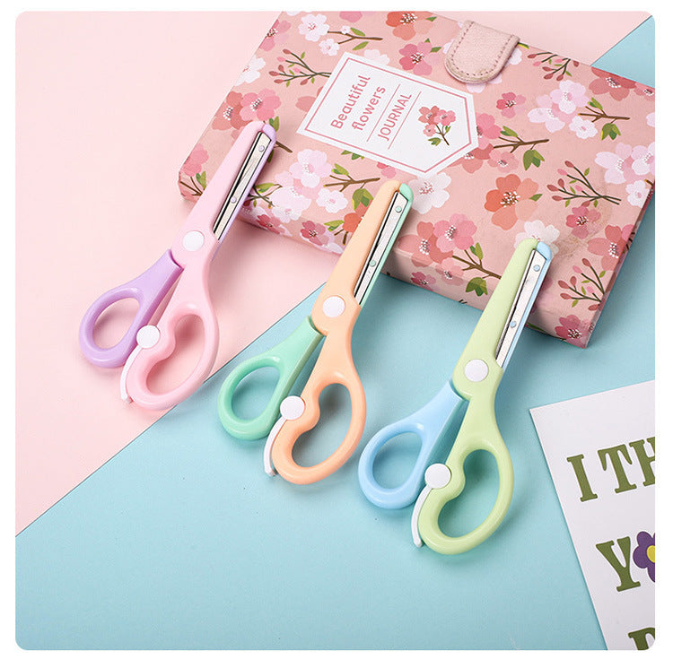 Kids safety scissors by IBG in colorful macaron design, featuring rounded blades for safe paper cutting for children.