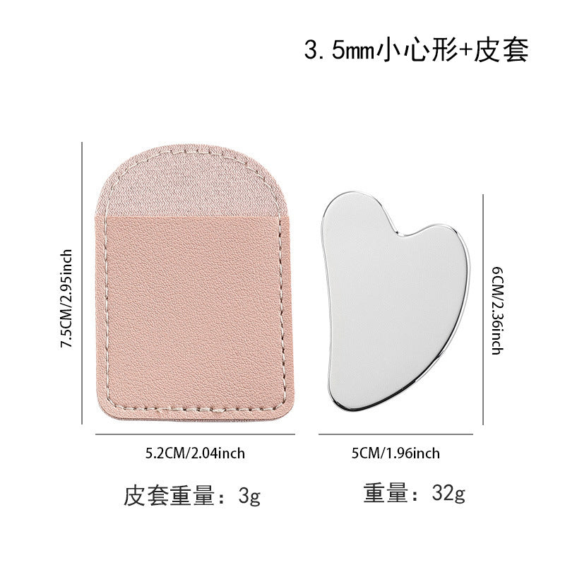 IBG stainless steel Gua Sha massage tool for facial and body skincare, featuring smooth, polished surface for gentle massage.