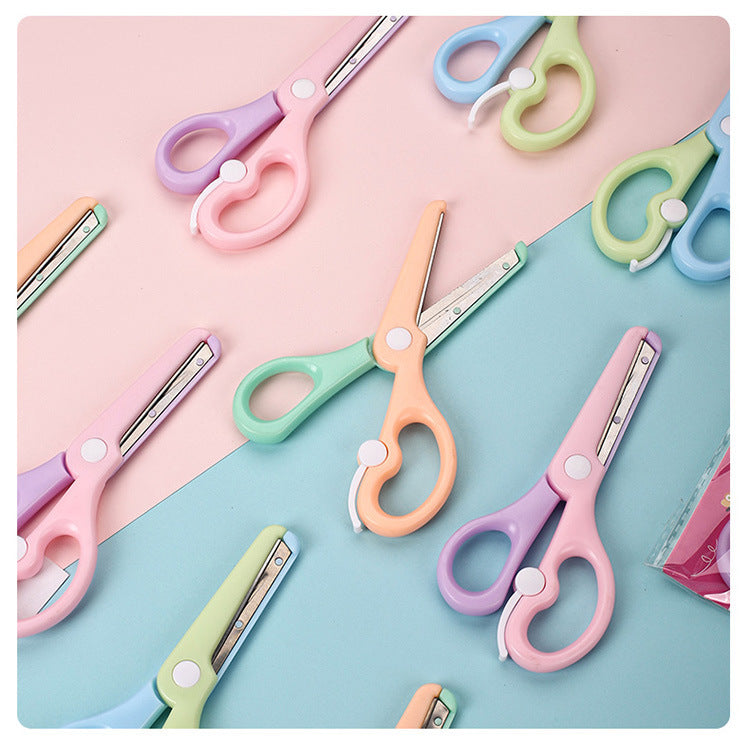 Kids safety scissors in macaron colors by IBG, designed for children and school use, featuring rounded tips and colorful handles.