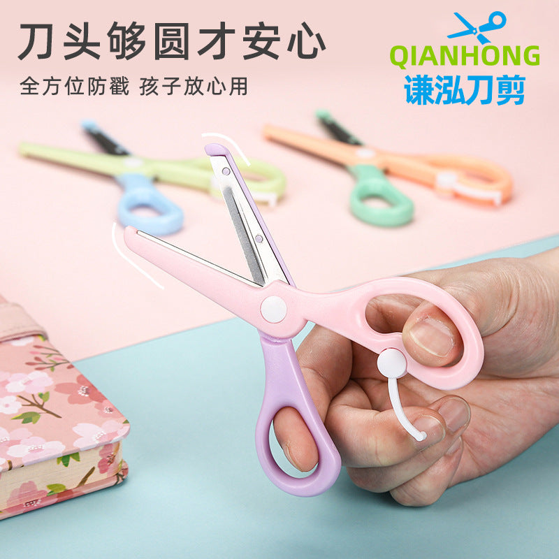 Kids safety scissors by IBG in macaron colors with rounded tips, designed for safe paper cutting for children and school use.
