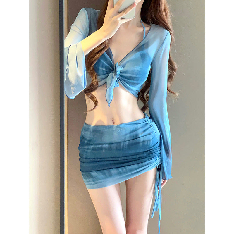 Women's IBG 4-piece long sleeve swimsuit set with matching tops and bottoms, perfect for swimming and beachwear.