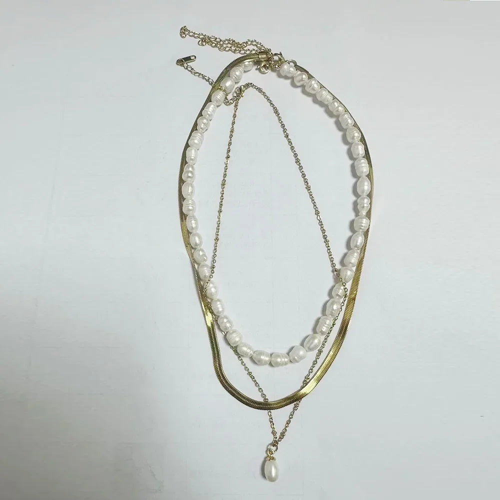 IBG stainless steel ball chain necklace, minimal everyday jewelry with sleek round beads, suitable for casual or layered styles.